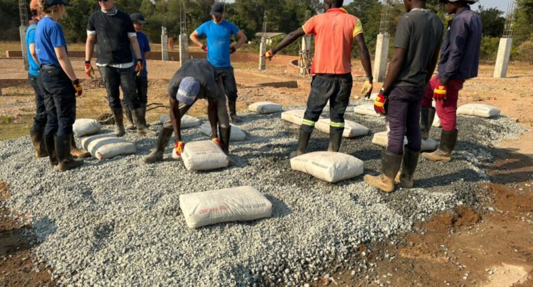 Friends of St. Rupert’s Mayer from Germany on a cultural exchange visit assist in the construction project at the Mission